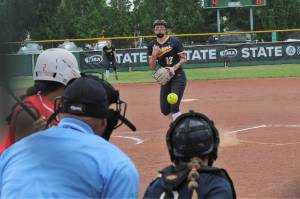 Spartan pitcher Chloe Gaydeski-St. John delivers the pitch to the Brewster batter during the Spartans first game of the State Softball tournament held over the weekend in Yakima. Forks defeated the Bears 13 to 5 and went on to place second in State. Catching is Kyra Neel and playing center field is Keira Johnson. Photo by Lonnie Archibald