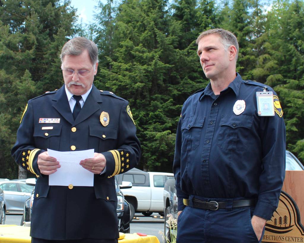 Superintendent Speer reads off the many positive qualities exemplifying OCC Correctional Officer of the Year Jason Huelsdonk. Photo Christi Baron