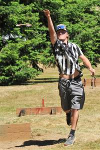 Dalton Kilmer throws a shoe in hopes of another ringer Saturday at Tillicm Park during the annual Horseshoe Tournament. The team of Floyd McCoy and Dalton Kilmer took first place. Photo by Lonnie Archibald