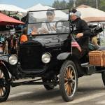 Grand Marshal Bob Bouck rides in a 1921 model T. Photo by Lonnie Archibald