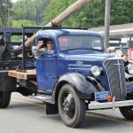 John Singhoses 1937 Chevy log truck driven by Steve Singhose, made the trip from Joyce with John riding shotgun.