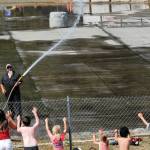 This was the only action at the arena on the 4th as kids asked to be sprayed with water while the arena floor was being watered down prior to what was to be the annual Demolition Derby. The derby was canceled, however, as emergency vehicles were called out to a large brush and structure fire along Bogachiel Way in Forks. Photo by Lonnie Archibald