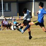 It was the Blue and the Gray, no this wasnt the civil war, the blue team was known as the PSGs and the Gray were the Wolves. Pictured here the 10 to 14-year-olds went toe to toe as you can see.