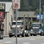 Dahlgren trucks led off a truck procession Saturday afternoon down Forks Avenue honoring long-time Forks resident Joel Dahlgren. They were joined by log, dump, and other types of trucks new and old from all over the area taking part in the tribute. The trucks then made their way, with the help of local Law enforcement blocking traffic, to the Dahlgren Farm on Bogachiel Way. There about 200 people gathered to pay their respects. Pastor Warren Johnson, Forks Congregational Church, officiated, and many shared stories. Joel was 92 years old and was a long-time employer of many, starting his logging business with his wife Ingrid in 1966. Photo Lonnie Archibald