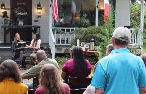 Author M.B. Thurman reads from her debut novel, Summoned, in front of the Miller Tree Inn, aka the Cullen House, during a pre-FTF event last Tuesday. M.B. (Mary Beth) and her husband Trent own the Inn. The FTF Festival also featured other authors at several other venues throughout the celebration. Photo Christi Baron