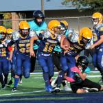 In Forks Junior High action Kingston Steffen powers his way through the Sequim defense. Also in the action for Forks are, from left, Andres Silva, Adon Arrellano, Pedro Francisco, and Yovany Lopez. Photo by Lonnie Archibald