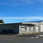 Volunteers and the Olympic Corrections Center crew recently came together to give a new fresh look on the Forks Community Food Bank building. A primer coat and a top coat were applied to the entire building. Submitted photo