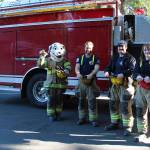 Forks Fire Department and Sparkey offered the Forks Forum Editor some candy!
