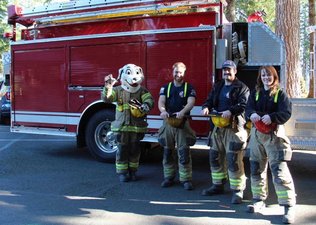 Forks Fire Department and Sparkey offered the Forks Forum Editor some candy!