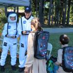 Greeters Linda and Stan were representing NASA as they welcomed a couple of Ghostbusters.