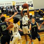 In FMS action against Blue Heron, Thomas Penn (5) rebounds. Also in the action are Pedro Francisco (10) and Ryder Fletcher (12). Blue Heron defeated the Forks 7th grade 36 to 27. Forks led at halftime but ran out of gas by the fourth quarter as they only had five eligible players. Photo by Lonnie Archibald