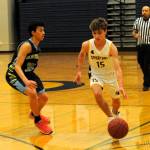 Driving on Blue Heron in 8th-grade action is Kingston Steffen (15). Photo by Lonnie Archibald