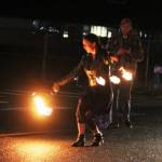 Heather Sky Lietzke added flaming batons to the mix of Christmas lights on boats, trucks, cars, buses, and ATVs during the annual Twinkle Light Holiday Parade in Forks on Saturday night.