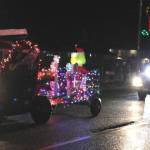 The Witherspoon family supported the parade with this entry, for some after-parade activities at Gingers Closet. It was a very Grinchy parade with many floats and costumes depicting the grouchy, grumpy green guy. Bill Plumley follows in his 1985 Cadillac Elks Mobile.