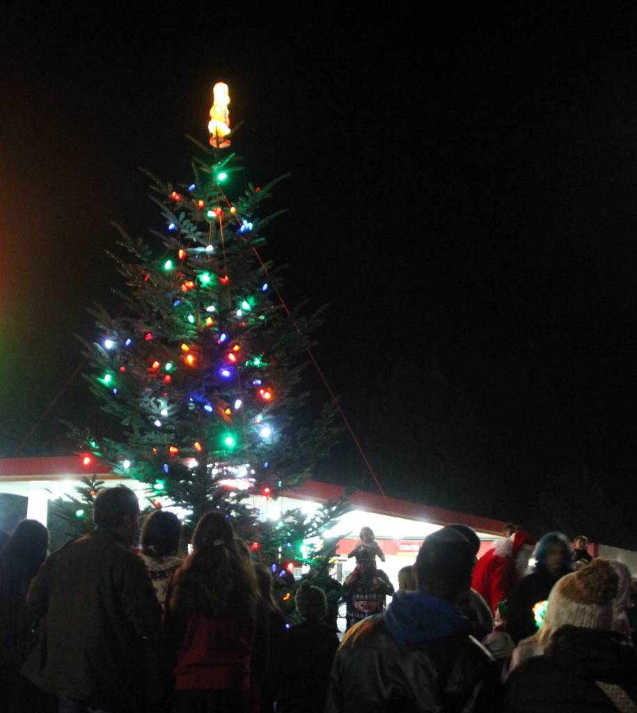 The parade made its way to Sol Duc Way and the community tree at the Triangle Lot. After a bit of technical difficulty and a countdown from 10, Santa lit the tree.