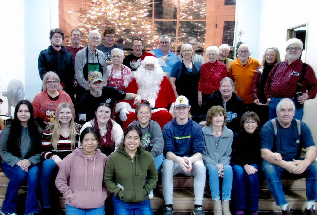Community members ages 15 to 50-plus took time to volunteer at the annual Breakfast with Santa last Saturday. Church members/volunteers cooked the breakfast, students from the FCCLA/FHS Culinary Class helped serve, and WEBPA members manned the door and took and printed photos. When it was all over … a group photo! Submitted photo