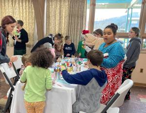 Troi Gale and the NOLS Forks Library Branch offered a craft table where everyone could make a Grinch Mask. Gale said about 50 masks were created! Photos Christi Baron