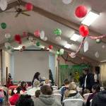 The screen was ready and chairs were in place after a quick clean-up after Breakfast with Santa. Kids and parents take their places getting ready for the movie to start. Everyone enjoyed cupcakes, popcorn, and hot chocolate.