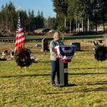 Local member of the Michael Trebert Chapter of DAR, Ilene Rogers, speaks at the Forks Cemetery on December 16 during the Wreaths Across America Ceremony. Also offering a message during the ceremony was Pastor Bob Schwartz of the Forks First Baptist Church. Across the US 3,700 locations participated in the ceremonies.