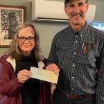 If you gave at the check-out stand at Forks Outfitters over this past holiday season … Congratulations! you helped raise $7,673.06 for our local Food Bank. Outfitters owner Bruce Paul said it was one of the biggest donations he can remember, We give incentives to the checkers to help raise the money, so they really have fun with it. Paul recently presented Forks Food Bank Executive Director Pat Soderlind with the check. Photo Christi Baron