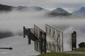 Two weeks ago in the Forks Forum, ice was seen covering the ramp to the float at Lake Pleasants Clallam County Park. By Saturday, Jan. 28 high water replaced the ice as rains came hard during the previous day and Sunday saw a high of close to 60 degrees. Over 4 inches of rain fell over the weekend. Pictured here the lake had risen partially covering the walkway to the float. Photo by Lonnie Archibald