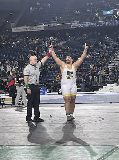For the second straight year, Spartan Sloan Tumaua is a state champion. Tumaua, the 2023 champion at 220 pounds, moved up to the 285-pound level this year. See story page 3.