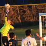 Goalie Juan Terrones makes the save in front of the net. Also shown is Estevan Ramos (2). Photo by Lonnie Archibald