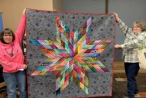 Vicki Queen and JoAnnn Lawson are holding Piecemakers Quilt Clubs raffle quilt. Tickets are available from club members, at the quilt show and some weekends at Forks Outfitters. Tickets are $2 each and the drawing will happen Sunday, April 21. Submitted photo
