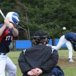 Spartan Gunner Rogers delivering the pitch was the winning pitcher in the first game. Photo by Lonnie Archibald