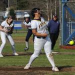 Elizabeth Soto pitching during the second game with Pe Ell. Covering first base is Kaidence Rigby. Photo by Lonnie Archibald