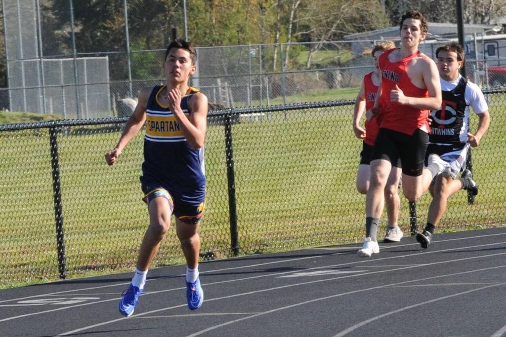 Pictured here Forks Noah Foster began to pull away from the pack in the 400 in which Foster placed first. He also placed first in the 100 and 200. Photo by Lonnie Archibald