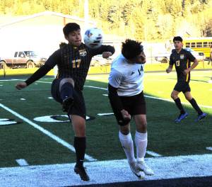 Spartan Kevin Udave Ramos (17) competes with Ravens Michael Numez for ball control on April 17 at Spartan Stadium where Raymond/South Bend defeated Forks 1 to 0. Looking on is Forks Mateo Lucas. Photo by Lonnie Archibald