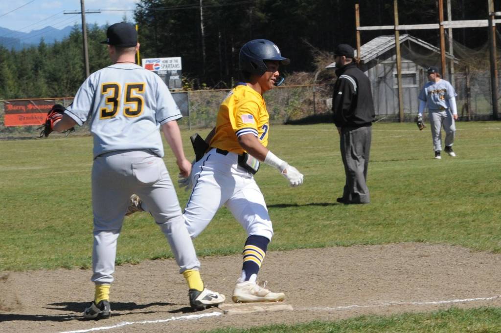 Spartan Bubba Hernandez-Stansbury rounds third with a 3 run in the park home run against North Beach who Forks defeated 14 to 0 and 14 to 0 in this double header held at the Fred Orr Memorial Park in Beaver. Photo by Lonnie Archibald