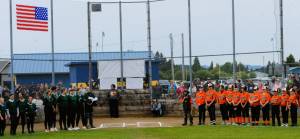 The Charge and the Orioles teams were just two of the eight teams who participated in the well-attended annual Kenny Church Memorial Tournament held at Duncan Fields in Forks. This photo was during the beginning of the opening ceremony, as all teams walked onto the field.