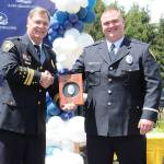 Speers presents Jacob Claussen with the 2023 Corrections Officer of the Year Award. Speers said Claussen leads by example. Photos Christi Baron