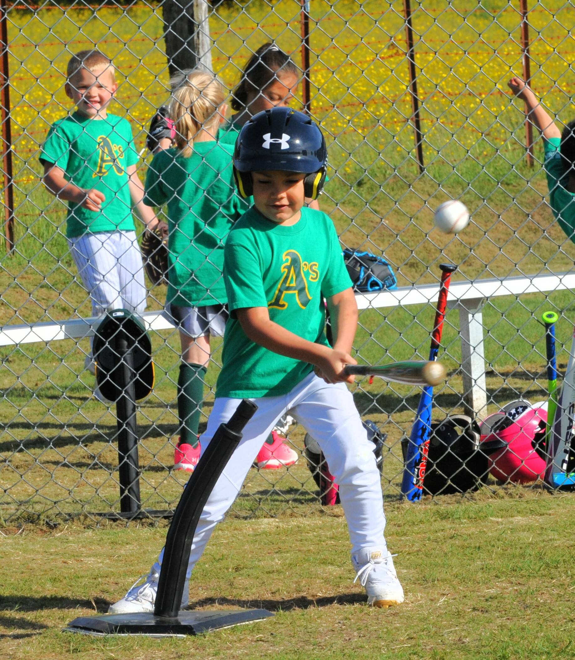 As hitter Kasson Riebe gets a hit against the Mariners.
