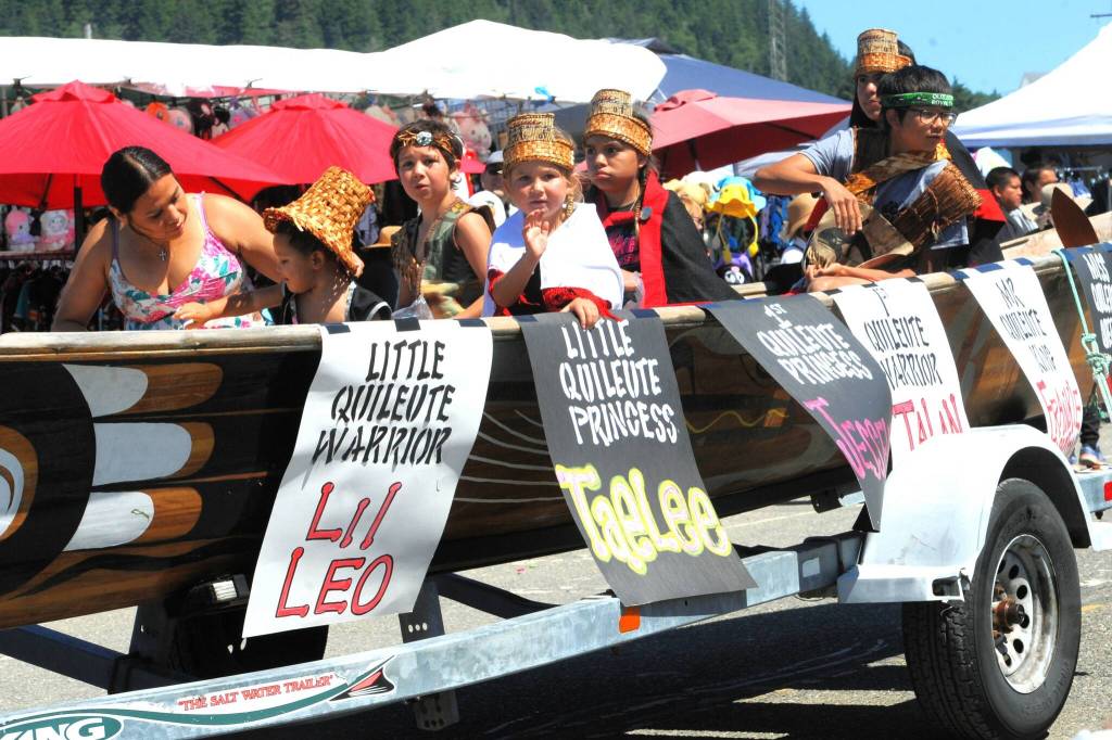 At left, the Quileute canoe with Royalty. 
Photo by Lonnie Archibald