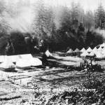 In 1918, the Beaver-Tyee area grew as hundreds of soldiers called the Spruce Division arrived and set up camp at the south end of Lake Pleasant. The contractor, Siems Carey, represented by H.S. Kerbaugh, was awarded the contract to remove 250 million board feet of spruce. Siems Carey built barracks, a mess hall, offices, a dance hall and post office  and even changed the name of the community to Siems Carey. In 1919 the name changed back.