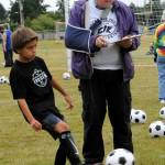 At age seven, Oscar Huskins makes contact.