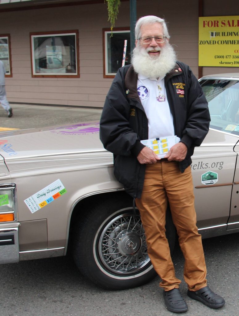 Bill with his Elks Cadillac …and in case he hasnt nabbed you yet …he has Elks Calendars for Sale!!
