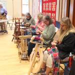 Spinners and weavers demonstrated their art form at the RAC while people mingled about during the day on Saturday.