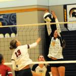 It was the story of the comeback kids on Sept. 24 in the Spartan gym as Forks who kept falling behind came back to defeat Hoquiam 3 to 2 in this non-conference contest. Pictured, here Forks Karee Neel goes for the block against Hoquiamss Piper Stankavich. Looking on are teammates Bailey Johnson and Erika Williams. Photo by Lonnie Archibald