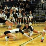 Typical of the Spartans fight for victory, Bailey Johnson and Chloe Gaydeski dive in an attempt to dig while teammates Fyn Peters and Erica Williams look on. There was great hustle by both teams in this contest won by Forks 3 to 2 over the Hoquiam Grizzlies on Sept. 24 in the Spartan Gym. Photo by Lonnie Archibald