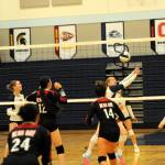 From left are Spartans Erika Williams (1), Bailey Johnson (2), Keana Rowley (9) and Chloe Gaydeski (6). Red Devils from left are Alexa Greene (24), Lillie Yallup (12) and Cerise Moss (14).