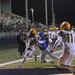 Forks coach Trevor Highfield signaled TD and he was correct as Spartan Noah Foster pulled in a Forks pass for the touchdown in front of a large crowd at Spartan Stadium putting Forks ahead 14 to 13 at the half against the Adna Pirates. Also in the photo is Spartan Cash Barajas (11). Photo by Lonnie Archibald