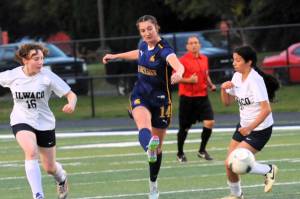 Spartan Molly Hampton controls the ball between Ilwaco players at Spartan Stadium where Forks defeated the Fishermen 4 to 0. Photo by Lonnie Archibald