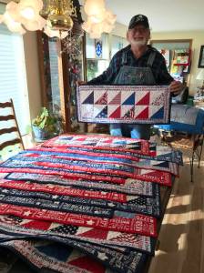 Piecemakers Club member, Martha Paul, donated 20 American Heroes table runners to Forks American Legion Post 106 Commander Bubba Bolin. These patriotic table runners will be gifted to veterans. Bubba, seen here in this photo, shared, It is an honor to have received those table runners and I will hand them out next week at our Coffee with Comrades on Thursday morning. Submitted photo