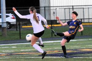 Spartan Allie Coons kicks past Adna who defeated Forks in this league contest at Spartan Stadium. Photo by Lonnie Archibald