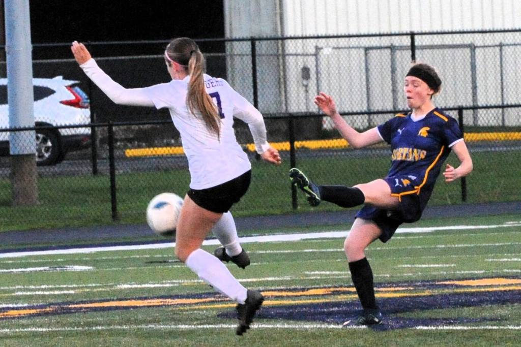 Spartan Allie Coons kicks past Adna who defeated Forks in this league contest at Spartan Stadium. Photo by Lonnie Archibald