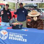 Smokey Bear and DNR staff are happy fire season is over with all the recent rain, but glad the rain held off during the event.